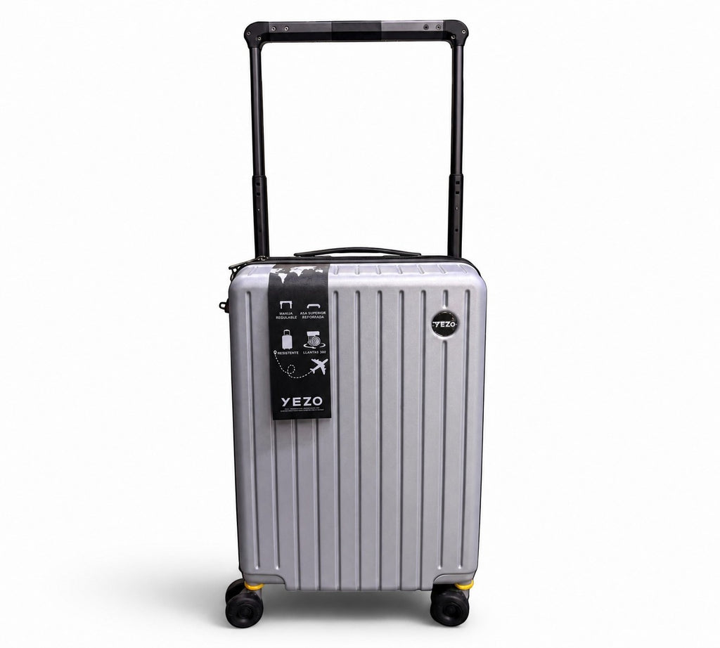 Maleta de viaje rígida plateada MAYORISTASBAG de 10kg con ruedas giratorias y mango telescópico ajustable.