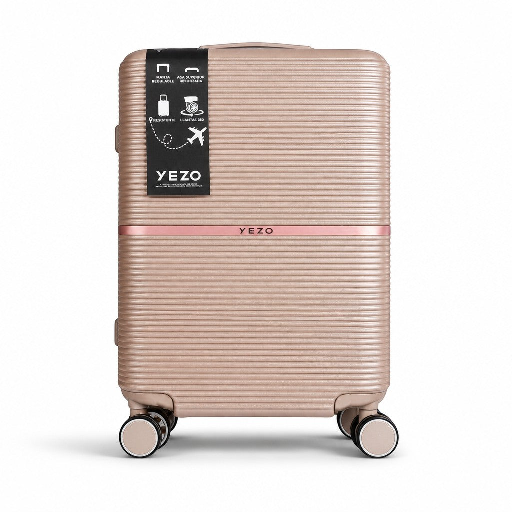 Maleta de viaje MAYORISTASBAG YEZO NOVA color rosa con acabado estriado, cuatro ruedas giratorias y asa ajustable.