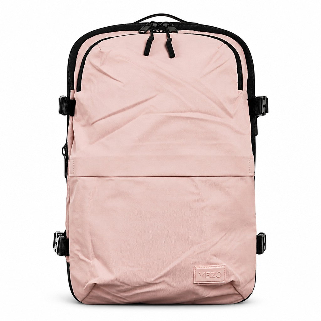 Morral de compresión MAYORISTASBAG color rosa en cuerina con sistema de expansión para viajes y uso diario