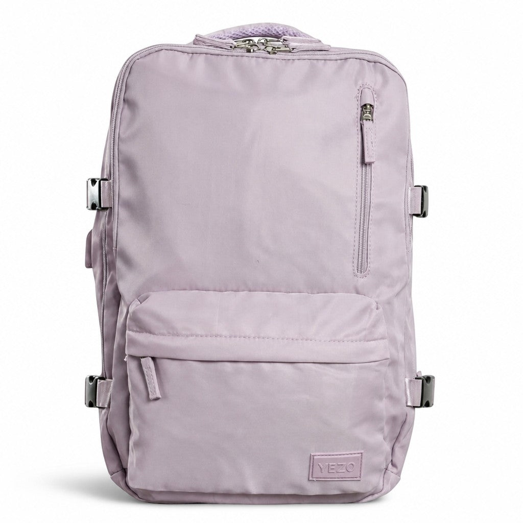 Morral YEZO 2211 de MAYORISTASBAG en color lila, con compartimento para portátil y diseño ergonómico resistente.