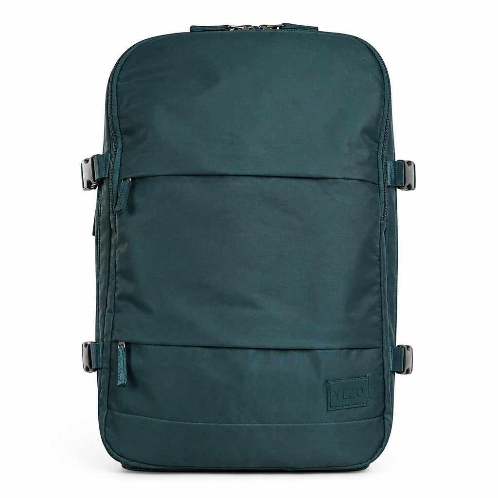 Morral YEZO 2210 de MAYORISTASBAG en color verde oscuro, diseño minimalista con compartimentos y correas laterales.